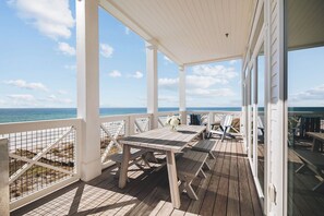Outdoor dining - Gulf-front luxury with infinity pool, direct beach access, game room, & elevator (Panama City Beach)