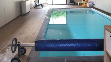 Alberca techada y alberca climatizada