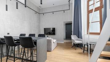 City Apartment | Living area | Smart TV