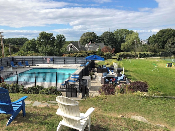 Seasonal outdoor pool, pool umbrellas, pool loungers