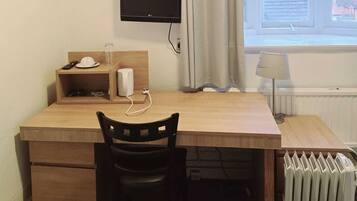 Desk, laptop workspace, free WiFi, bed sheets