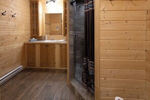 Shower, hair dryer, towels, toilet paper