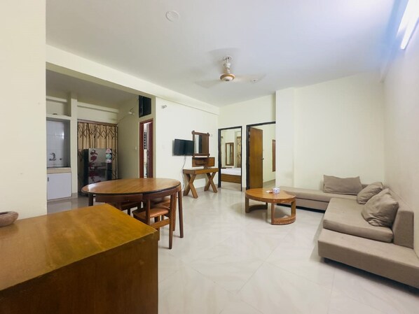 Deluxe appartement | Woonruimte | Een flatscreentelevisie