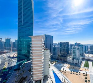 Surrounded by a tranquil urban landscape, this high-rise building offers a serene setting for relaxation.