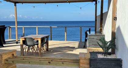 Luxury Oceanfront Retreat with Panoramic Views and Modern Comforts