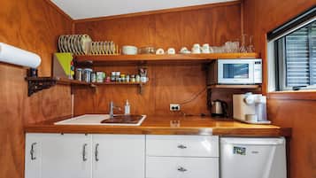 Fridge, microwave, coffee/tea maker, toaster