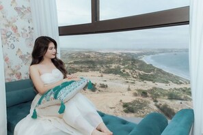 Premium suite, 1 slaapkamer, gedeeltelijk uitzicht op oceaan, op Executive-verdieping | Uitzicht op strand/zee