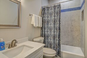 Shower, hair dryer, towels, shampoo