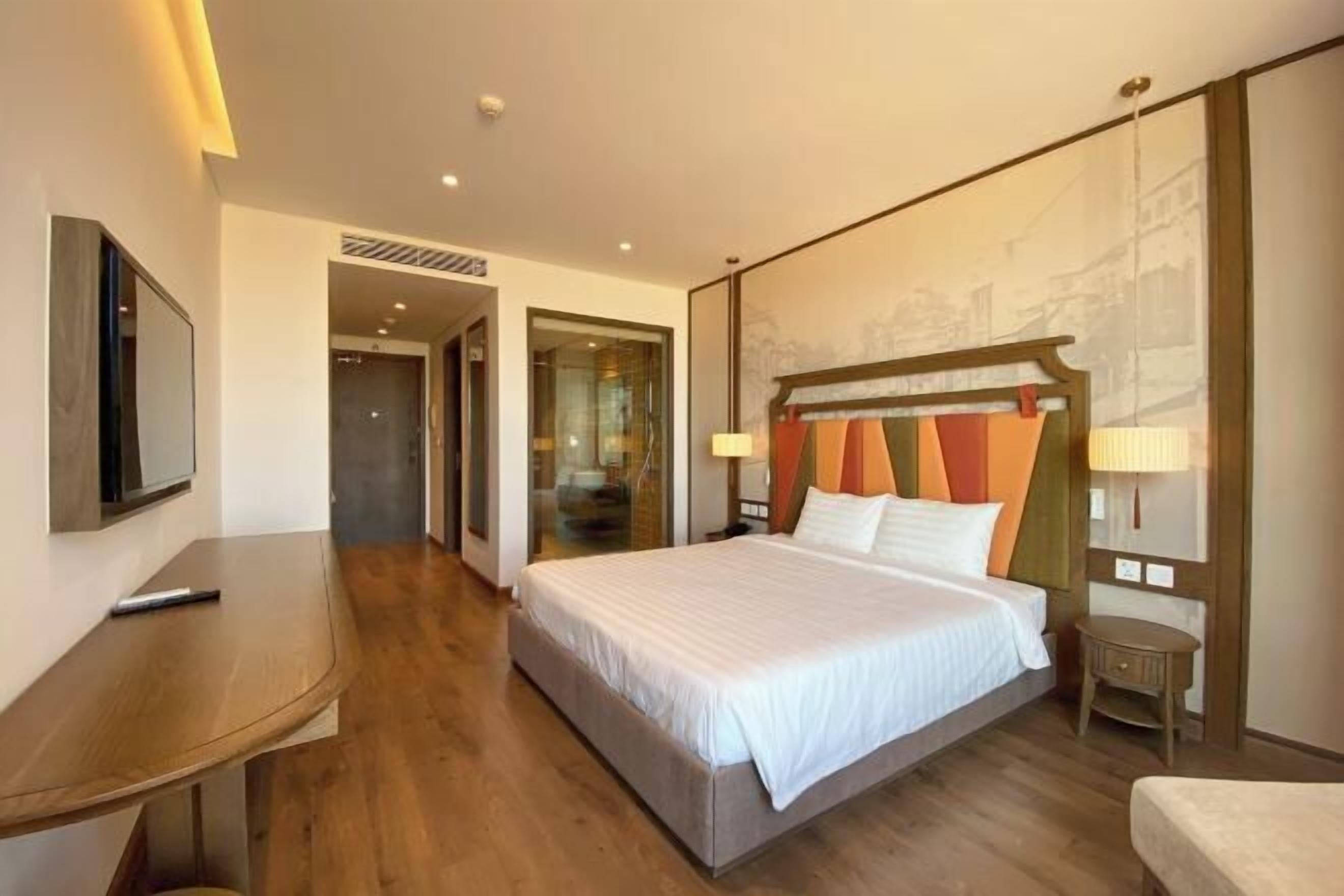 Premium bedding, down comforters, Tempur-Pedic beds, free minibar