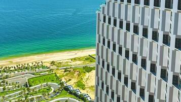 Private beach, white sand, free beach shuttle, sun-loungers