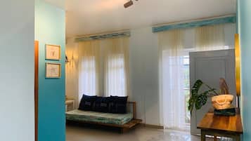 Appartement Deluxe, 1 grand lit, entretien ménager, en coin | Aire de séjour