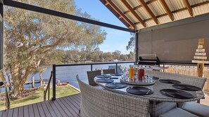 Outdoor dining - Pelicans Retreat - Luxury Riverside Escape with Private Jetty (North Yunderup)