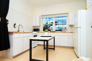 Fridge, microwave, oven, stovetop - 2-bedroom Studio Suite for Content Creators! (Nassau)