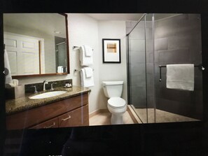 Jetted tub, hair dryer, towels, soap