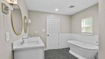 Shower, towels, soap, toilet paper
