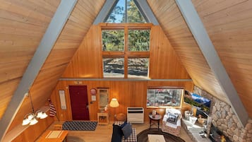 House, Multiple Beds, Patio, Mountain View (The Squirrel's Nest) | Living area | 50-inch flat-screen TV with digital channels, fireplace