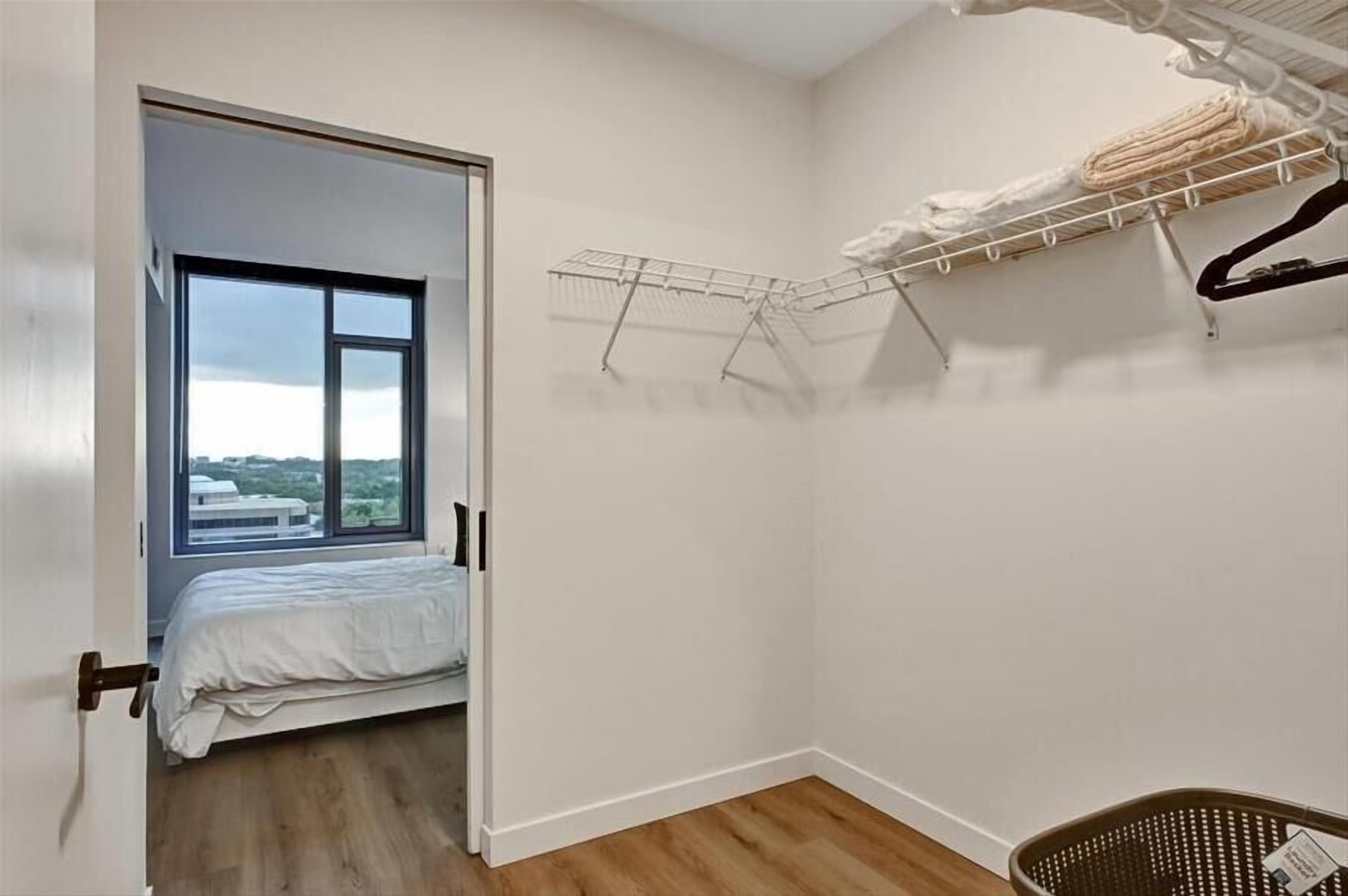 1 bedroom, desk, iron/ironing board, travel crib