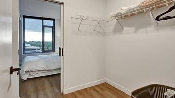 1 bedroom, desk, iron/ironing board, travel crib