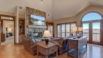 Smart TV, chimenea, reproductor de DVD y futbolito