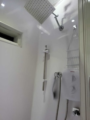 Shower, towels, soap, shampoo