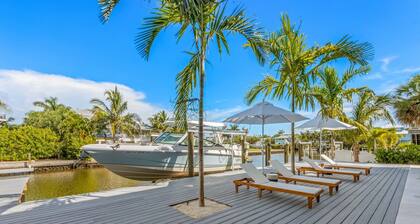 Bimini Sunrise: On Canal! Dock! Pool! Rooftop Deck by Anna Maria Life Vacation Rentals