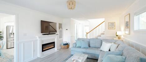 Smart TV, fireplace, books