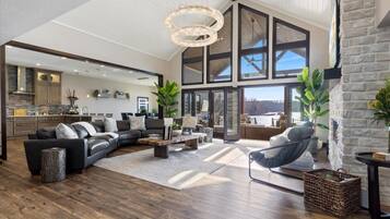 Smart TV, fireplace, books, stereo