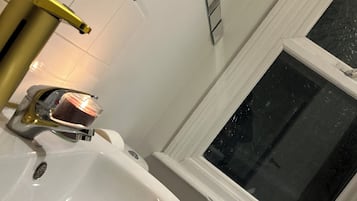 Hair dryer, towels, soap, toilet paper