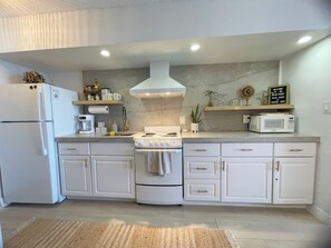 Fridge, microwave, oven, stovetop - Newly Renovated Ocean Front Studio in Daytona Beach (Daytona Beach)