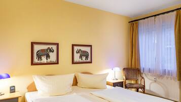 1 habitación, tabla de planchar con plancha, wifi gratis y ropa de cama