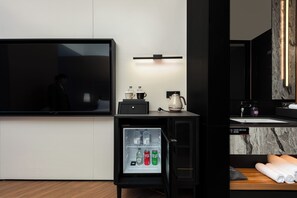 Colchones con acolchado adicional y minibar con artículos gratuitos