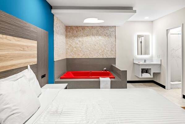 Kamer, 1 kingsize bed, bubbelbad | Een bureau, gratis wifi