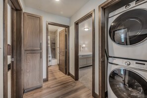Shower, hair dryer, towels, shampoo