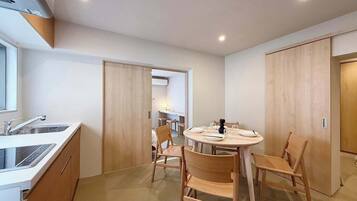 Fridge, microwave, cookware/dishes/utensils