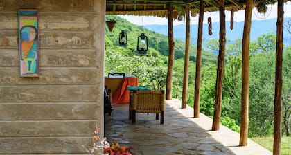 Luxury River Side cottage with magnificent views of sagalla and chawia hills.