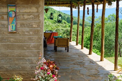Luxury River Side cottage with magnificent views of sagalla and chawia hills. 