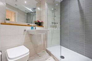 Shower, towels, soap, shampoo
