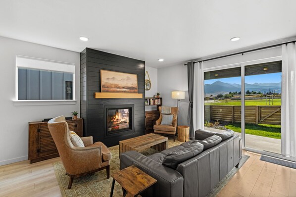 Smart TV, fireplace, foosball, books