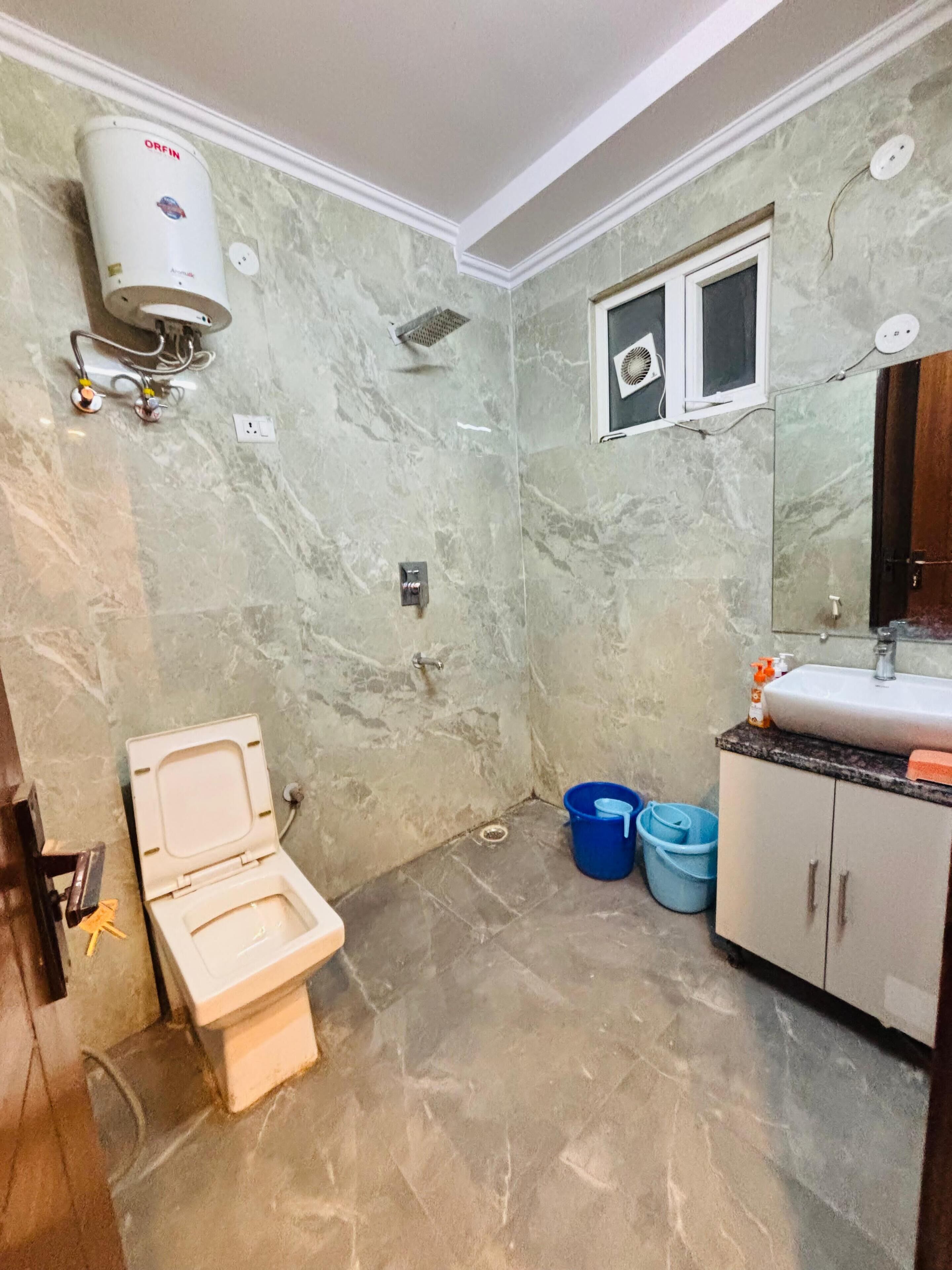 Shower, bidet, towels, soap