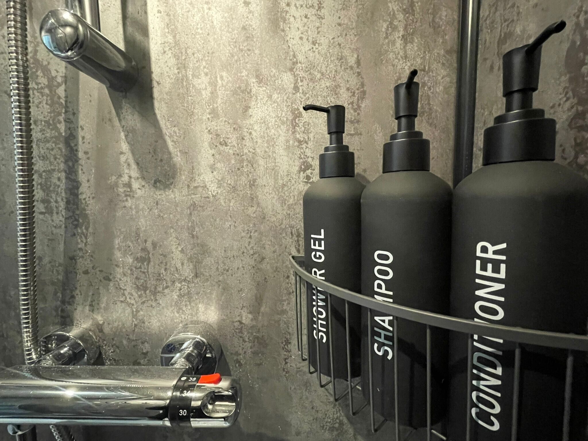 Shower, towels, toilet paper