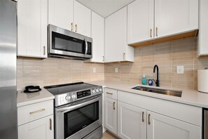 Fridge, microwave, oven, stovetop - Nicely Updated Two Bedroom Bayside OC Condo (Ocean City)