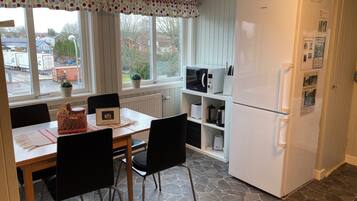 Apartment, City View | Private kitchen | Full-size fridge, microwave, oven, stovetop