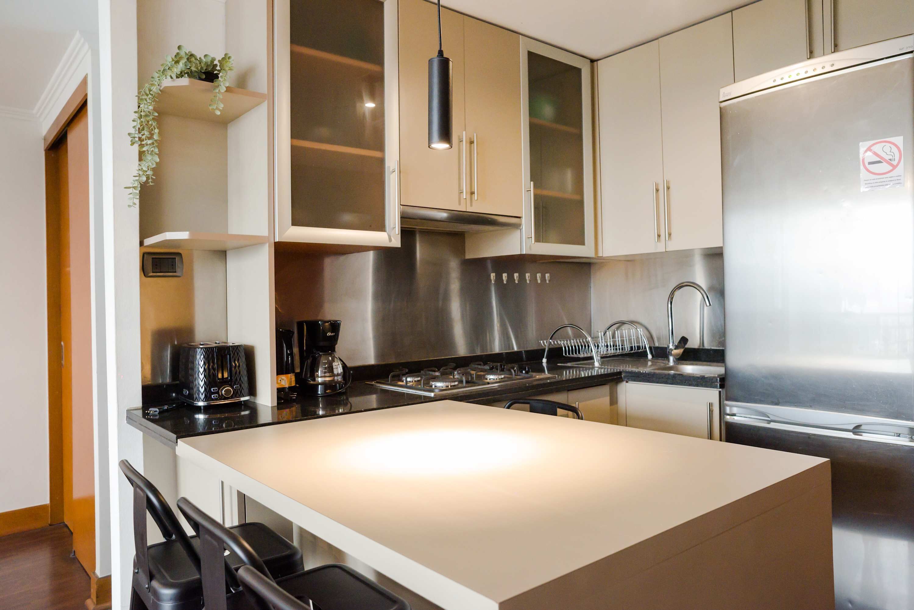 Fridge, microwave, stovetop, coffee/tea maker