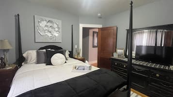 2 quartos, ferros/tábuas de passar roupa, berço de viagem