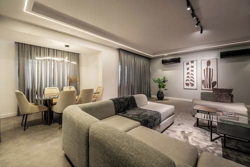 Superior Apartment, 3 Bedrooms, Balcony | Living area | 50-inch Smart TV with cable channels