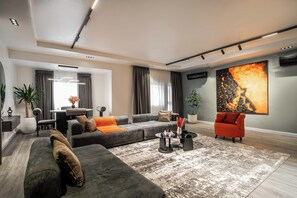 Superior Apartment, 3 Bedrooms, Balcony | Living area | 50-inch Smart TV with cable channels - George Residence SDA Court Ikoyi (Lagos)