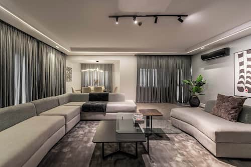 Superior Apartment, 3 Bedrooms, Balcony | Living area | 50-inch Smart TV with cable channels