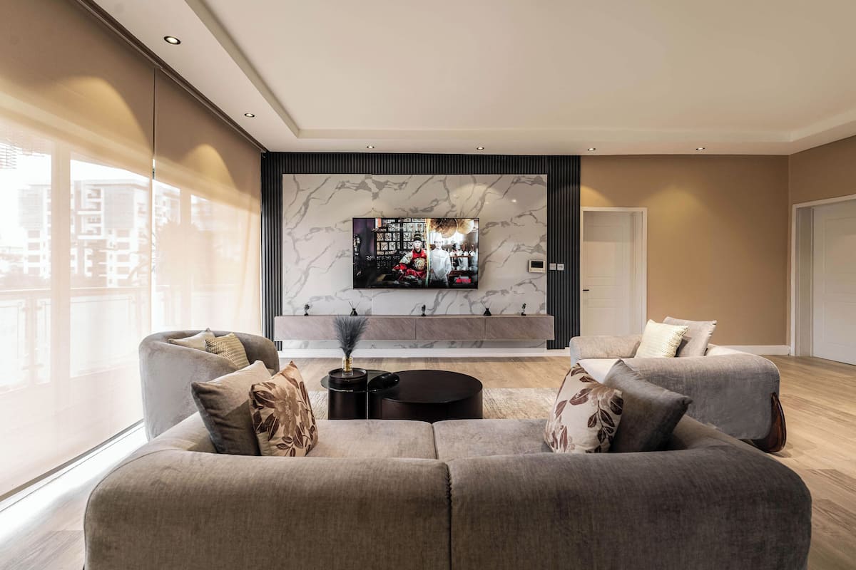Superior Apartment, 3 Bedrooms, Balcony | Living area | 50-inch Smart TV with cable channels