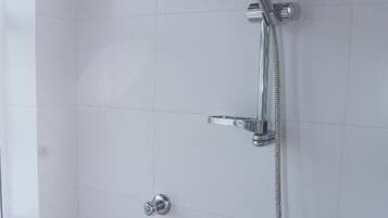 Deluxe Double Room, Balcony | Bathroom | Shower, hair dryer, towels, soap