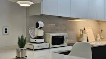Fridge, microwave, cookware/dishes/utensils